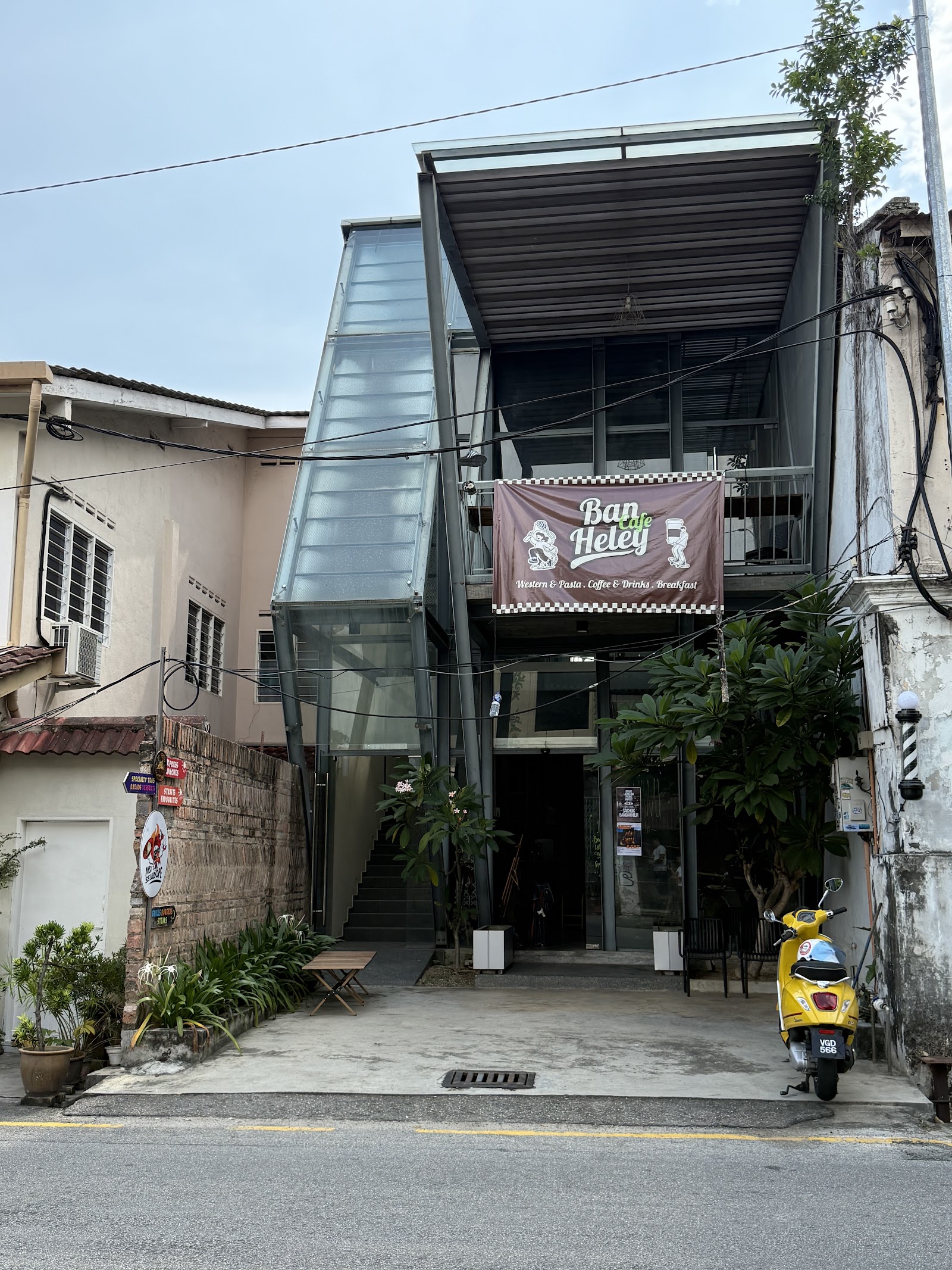 Street-level view of the shophouse building on Jalan Parameswara — look for the barber pole by the entrance